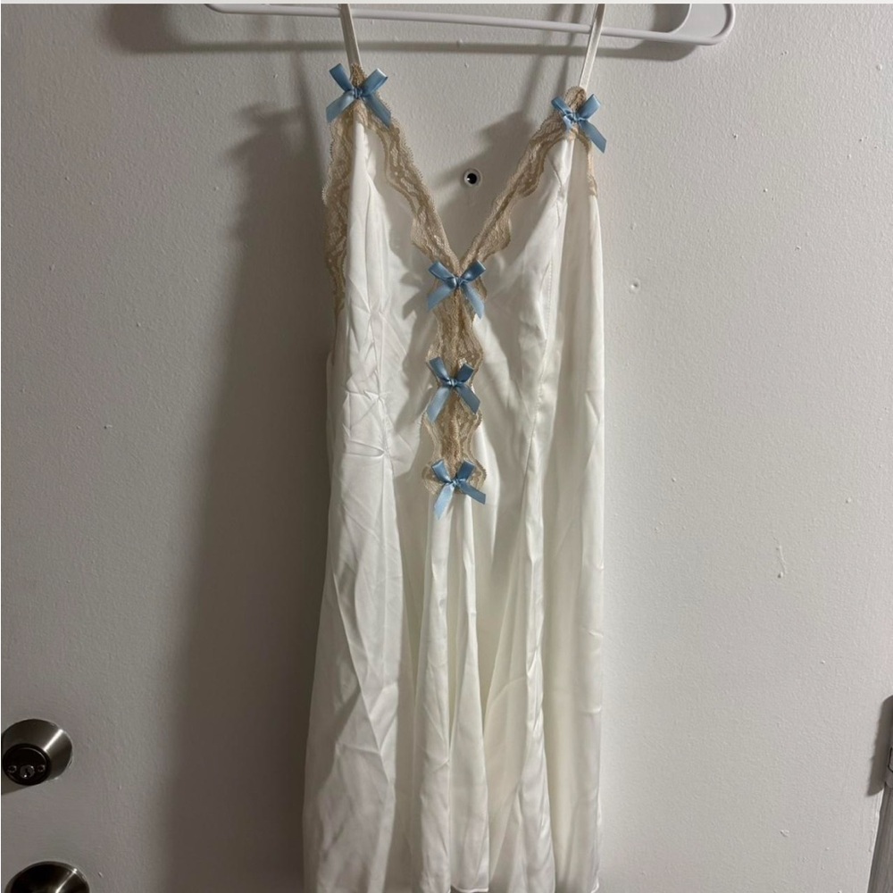 Elegant White Nightgown with Blue Bow Accents